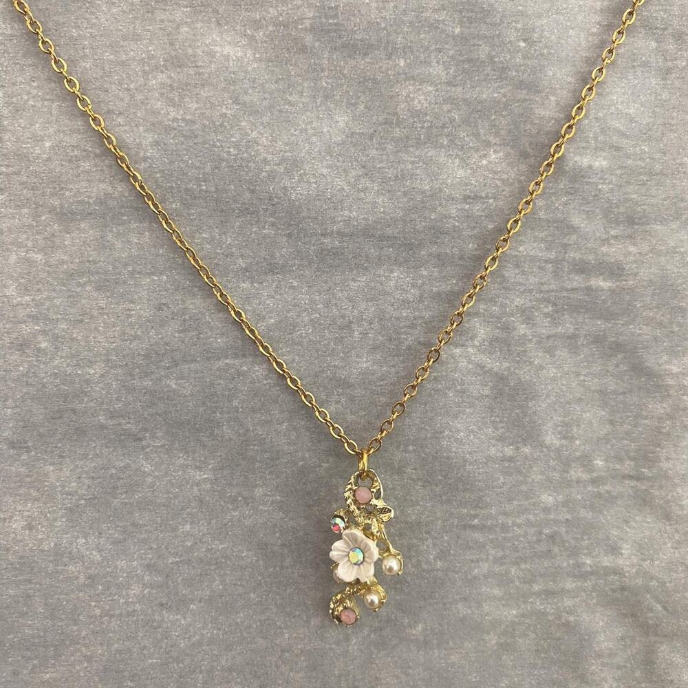 Dainty handmade gold flower necklace with rhinestone details